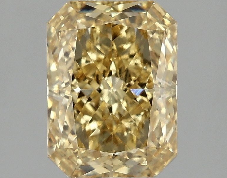 IGI Radiant 2.12ct Fancy Vivid Yellow VVS2 Loose Lab Diamond: IGI Radiant 2.12ct Fancy Vivid Yellow VVS2 Loose Lab Diamond Experience the brilliance of nature's own sunshine with this 2.12ct Fancy Vivid Yellow VVS2 loose lab diamond, certified by IGI and boastin