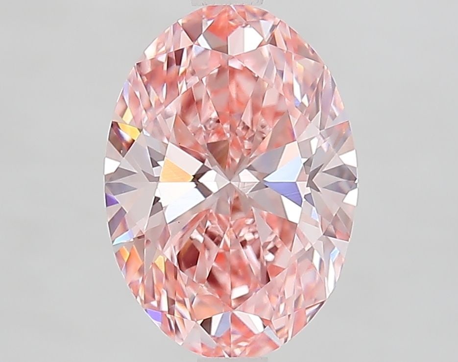 IGI Oval 2.59ct Fancy Vivid Pink VVS2 Loose Lab Diamond: IGI Oval 2.59ct Fancy Vivid Pink VVS2 Loose Lab Diamond Experience the rare beauty of a Fancy Vivid Pink diamond, one of the most coveted colors in the world of gemstones. This stunning 2.59ct lab-gro