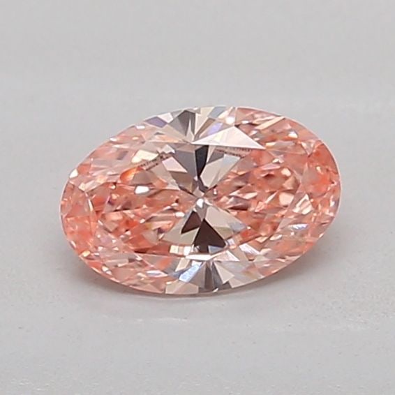 IGI Oval 0.44ct Fancy Vivid Pink VVS2 Loose Lab Diamond: IGI Oval 0.44ct Fancy Vivid Pink VVS2 Loose Lab Diamond Experience the rare beauty of a Fancy Vivid Pink diamond, one of the most coveted colors in the world of gemstones. This stunning 0.44ct lab-gro