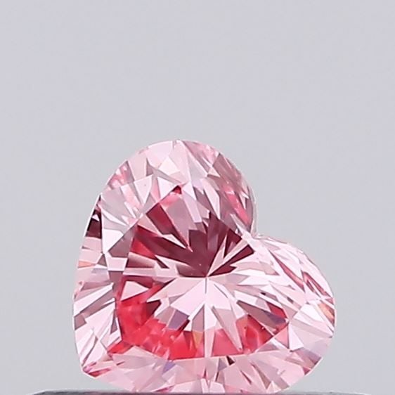 Loose Lab Diamond - Heart 0.15ct Fancy Vivid Pink VVS2: Loose Lab Diamond - Heart 0.15ct Fancy Vivid Pink VVS2 Experience the beauty of a lab-grown diamond, certified as Fancy Vivid Pink with exceptional clarity and cut. This stunning 0.15ct gem shines wit