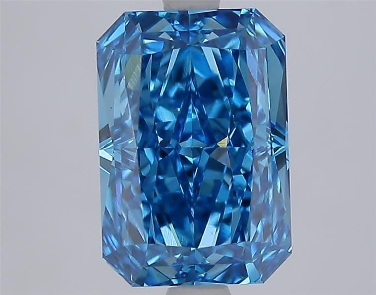 IGI Radiant 3.09ct Fancy Vivid Blue VVS2 Loose Lab Diamond: IGI Radiant 3.09ct Fancy Vivid Blue VVS2 Loose Lab Diamond Experience the breathtaking beauty of this 3.09ct Fancy Vivid Blue VVS2 loose lab diamond, certified by IGI and boasting exceptional clarity,