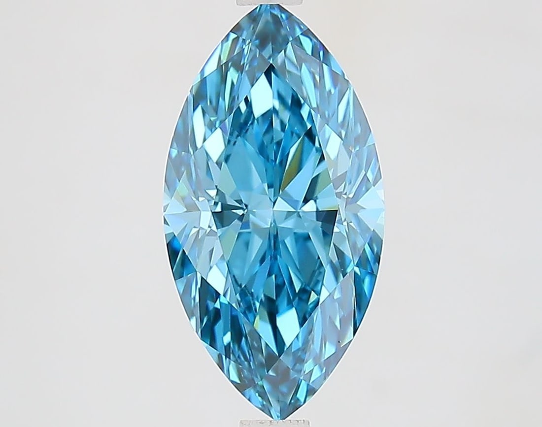 IGI Marquise 2.51ct Fancy Vivid Blue VVS2 Loose Lab Diamond: IGI Marquise 2.51ct Fancy Vivid Blue VVS2 Loose Lab Diamond Experience the rare beauty of a Fancy Vivid Blue lab diamond, boasting exceptional clarity and cut quality in its 2.51ct IGI-certified marqu