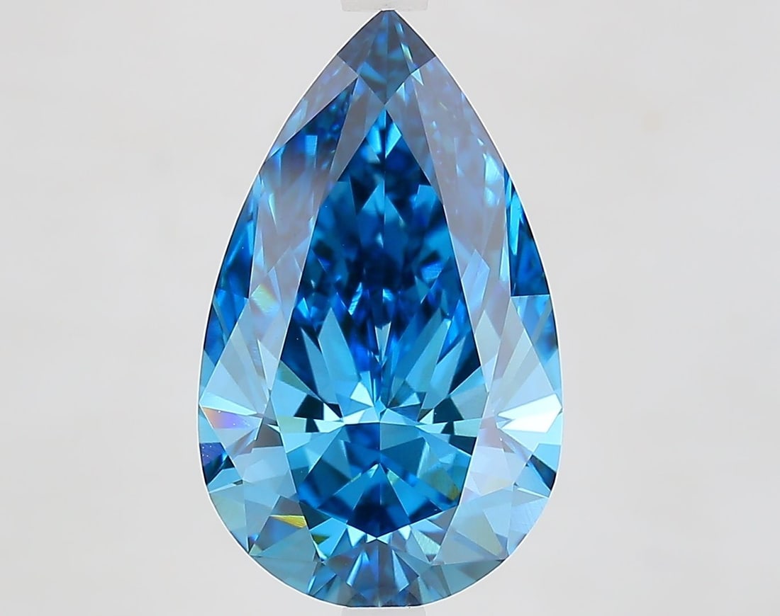 Loose Lab Diamond - IGI Pear 5.08ct Fancy Vivid Blue VVS2: Loose Lab Diamond - IGI Pear 5.08ct Fancy Vivid Blue VVS2 Experience the breathtaking beauty of a lab-grown diamond, certified by the International Gemological Institute (IGI) as Fancy Vivid Blue, wit