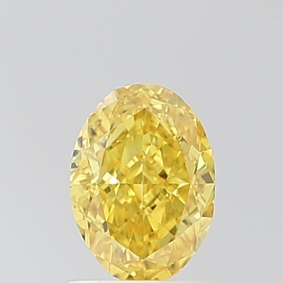 IGI Oval 1.02ct Fancy Vivid Yellow VVS2 Loose Lab Diamond: IGI Oval 1.02ct Fancy Vivid Yellow VVS2 Loose Lab Diamond Experience the brilliance of a lab-grown diamond, certified by the International Gemological Institute (IGI) as Fancy Vivid Yellow with except
