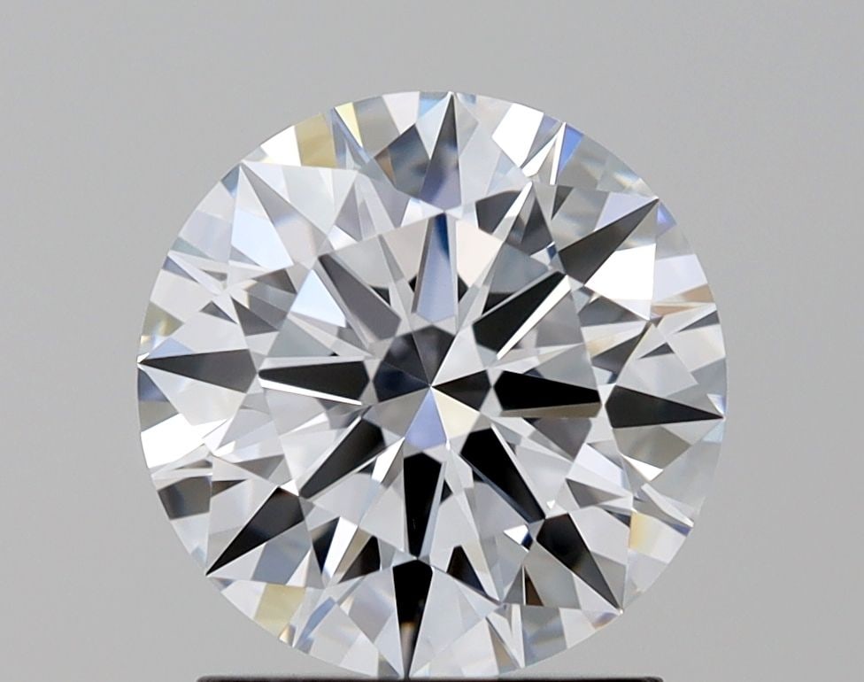 IGI Round 1.55ct F VVS2 Loose Lab Diamond: IGI Round 1.55ct F VVS2 Loose Lab Diamond Experience the brilliance of a lab-grown diamond, certified by IGI as an exceptional 1.55ct F VVS2 Round. This flawless gem boasts an EX cut, color, and symme