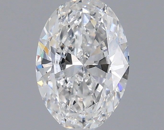 IGI Oval Diamond 0.53ct D VVS2: IGI Oval Diamond 0.53ct D VVS2 Experience the exceptional brilliance of this lab-grown IGI Oval Diamond, boasting a stunning D color and VVS2 clarity for unparalleled light transmission. With its prec