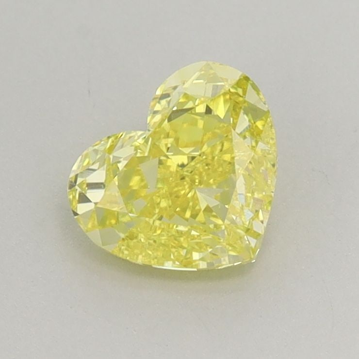 Loose Lab Diamond - IGI Heart 0.86ct Fancy Vivid Yellow VVS2: Loose Lab Diamond - IGI Heart 0.86ct Fancy Vivid Yellow VVS2 Experience the exceptional beauty of this lab-grown diamond, boasting an impressive 0.86 carat weight and a vibrant Fancy Vivid Yellow colo