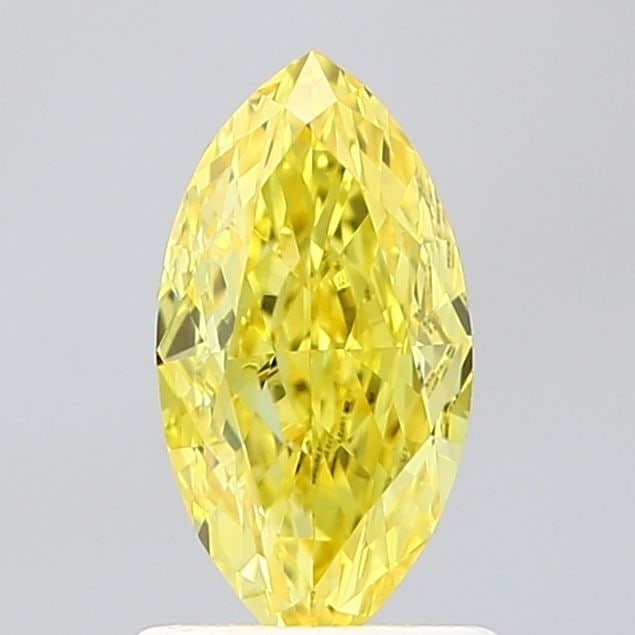 IGI Marquise 1.07ct Fancy Vivid Yellow VVS2 Loose Lab Diamond: IGI Marquise 1.07ct Fancy Vivid Yellow VVS2 Loose Lab Diamond Experience the brilliance of nature's own sunshine with this exquisite 1.07ct Fancy Vivid Yellow VVS2 lab-grown diamond, boasting exceptio