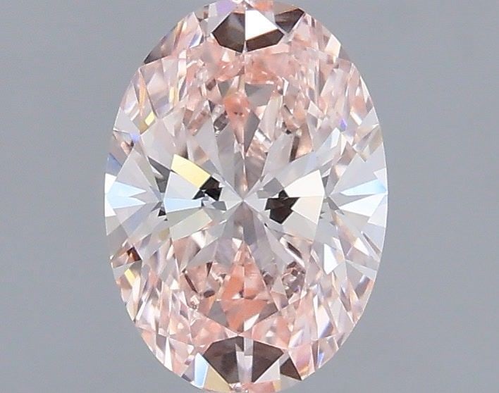 IGI Oval 1.12ct Fancy Intense Pink VVS2 Loose Lab Diamond: IGI Oval 1.12ct Fancy Intense Pink VVS2 Loose Lab Diamond Experience the rare beauty of a Fancy Intense Pink diamond, one of the most coveted colors in the world of gemstones. This stunning 1.12ct ova