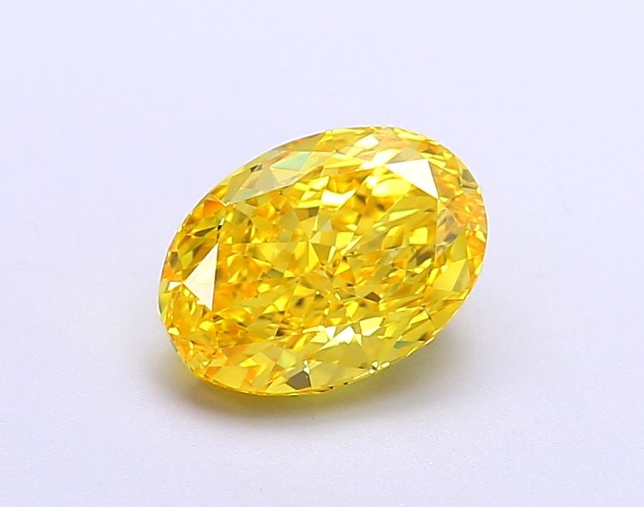 IGI Oval 1.63ct Fancy Vivid Yellow VVS2 Loose Lab Diamond: IGI Oval 1.63ct Fancy Vivid Yellow VVS2 Loose Lab Diamond Experience the vibrant beauty of nature in this stunning 1.63ct Fancy Vivid Yellow VVS2 loose lab diamond, certified by IGI and boasting excep