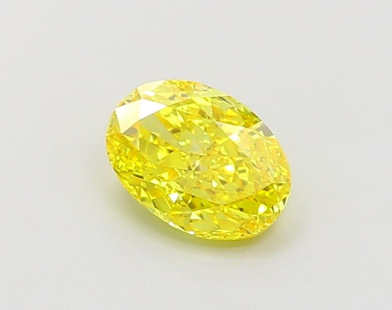 IGI Oval 1.01ct Fancy Vivid Yellow VVS2 Loose Lab Diamond: IGI Oval 1.01ct Fancy Vivid Yellow VVS2 Loose Lab Diamond Experience the brilliance of nature's own sunshine in this stunning 1.01ct Fancy Vivid Yellow VVS2 lab-grown diamond, certified by the Interna