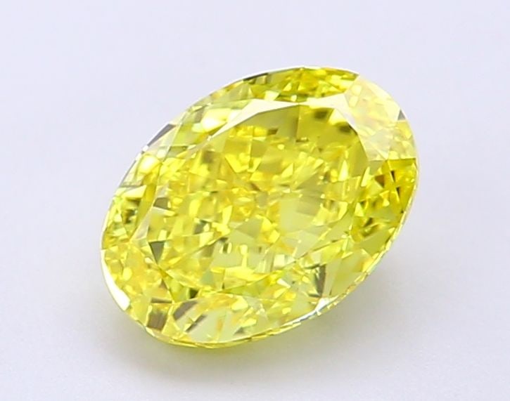 IGI Oval 1.59ct Fancy Vivid Yellow VVS1 Loose Lab Diamond: IGI Oval 1.59ct Fancy Vivid Yellow VVS1 Loose Lab Diamond Experience the brilliance of nature in a lab-grown wonder - this 1.59ct Fancy Vivid Yellow VVS1 loose diamond shines with exceptional clarity
