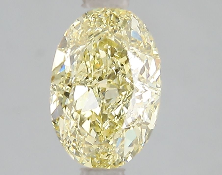 IGI Oval 2.0ct Fancy Intense Yellow VVS2 Loose Lab Diamond: IGI Oval 2.0ct Fancy Intense Yellow VVS2 Loose Lab Diamond Experience the vibrant beauty of nature in this stunning 2.0ct Fancy Intense Yellow VVS2 lab-grown diamond, certified by IGI and boasting