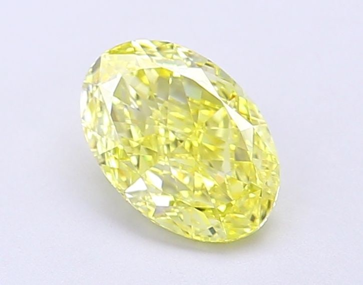 IGI Oval 1.04ct Fancy Vivid Yellow VVS2 Loose Lab Diamond: IGI Oval 1.04ct Fancy Vivid Yellow VVS2 Loose Lab Diamond Experience the brilliance of nature in a lab-grown diamond, boasting an exceptional 1.04ct Fancy Vivid Yellow VVS2 clarity and EX polish, maki