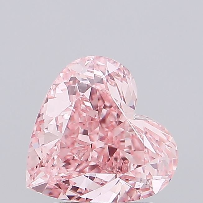 Loose Lab Diamond - IGI Heart 2.05ct Fancy Vivid Pink VVS2: Loose Lab Diamond - IGI Heart 2.05ct Fancy Vivid Pink VVS2 Experience the rare beauty of a lab-grown diamond, certified by IGI as Fancy Vivid Pink with exceptional clarity and polish. This 2.05ct gem