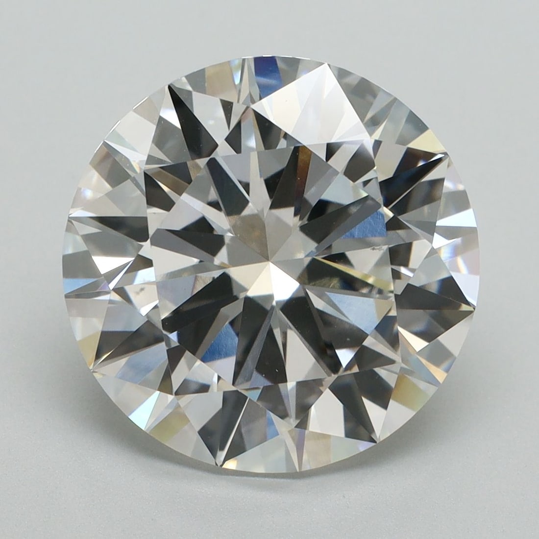 IGI Round 7.06ct E VVS2 Diamond: IGI Round 7.06ct E VVS2 Diamond A rare and exceptional laboratory-grown diamond, certified by the International Gemological Institute (IGI), boasts an impressive 7.06 carats of unparalleled brilliance