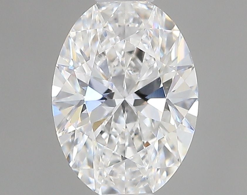 IGI Oval 0.7ct E VVS2 Loose Lab Diamond: IGI Oval 0.7ct E VVS2 Loose Lab Diamond Experience the beauty of a lab-grown diamond, certified by the International Gemological Institute (IGI) as a stunning 0.7ct E VVS2 Oval cut gemstone. Its