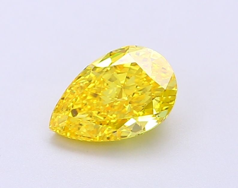 Loose Lab Diamond - IGI Pear 1.0ct Fancy Vivid Yellow VVS2: Loose Lab Diamond - IGI Pear 1.0ct Fancy Vivid Yellow VVS2 Experience the brilliance of a lab-grown diamond, certified by the International Gemological Institute (IGI) as Fancy Vivid Yellow, with exce