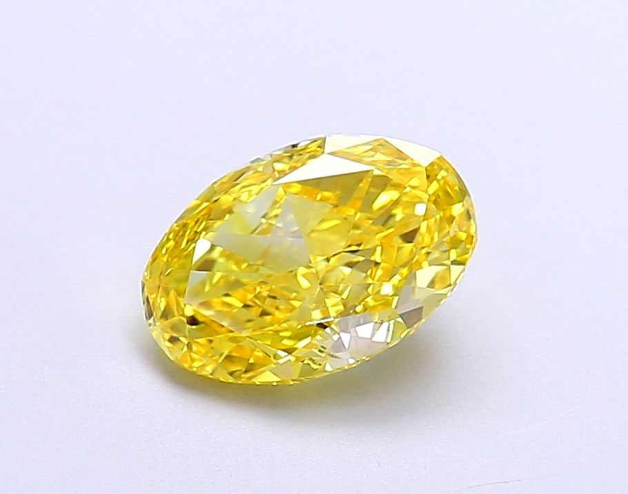 IGI Oval 1.53ct Fancy Vivid Yellow VVS1 Loose Lab Diamond: IGI Oval 1.53ct Fancy Vivid Yellow VVS1 Loose Lab Diamond Experience the brilliance of nature's own sunshine in this stunning 1.53ct Fancy Vivid Yellow VVS1 loose lab diamond, certified by IGI and boa