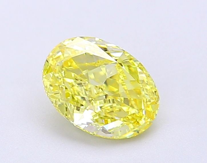 IGI Oval 1.0ct Fancy Vivid Yellow VVS1 Loose Lab Diamond: IGI Oval 1.0ct Fancy Vivid Yellow VVS1 Loose Lab Diamond Experience the radiant beauty of nature in the IGI Oval 1.0ct Fancy Vivid Yellow VVS1 Loose Lab Diamond, boasting an exceptional cut, vivid yel