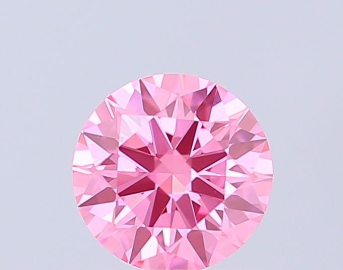 IGI Round 0.52ct Fancy Vivid Pink VVS2 Ideal Loose Lab Diamond: IGI Round 0.52ct Fancy Vivid Pink VVS2 Ideal Loose Lab Diamond Experience the beauty of nature in a lab-grown diamond, certified by IGI as Fancy Vivid Pink with exceptional clarity and cut. This stunn