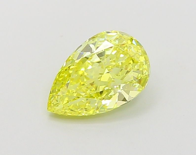 Loose Lab Diamond - IGI Pear 1.31ct Fancy Vivid Yellow VVS2: Loose Lab Diamond - IGI Pear 1.31ct Fancy Vivid Yellow VVS2 Experience the exceptional brilliance of this stunning 1.31ct lab-grown diamond, boasting a vibrant Fancy Vivid Yellow hue and exceptional c