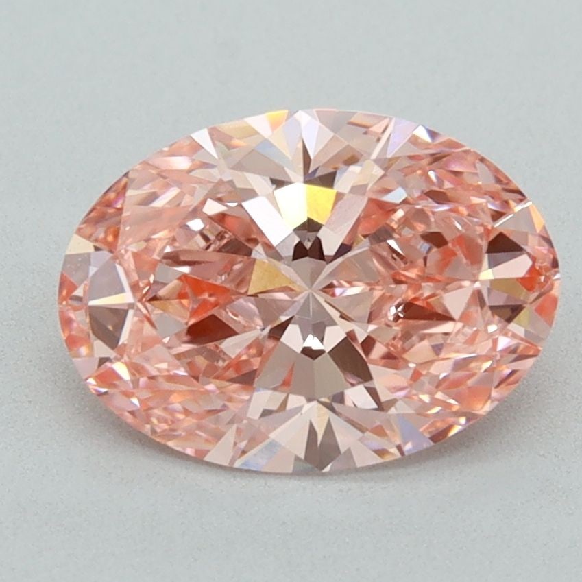 IGI Oval 2.05ct Fancy Vivid Pink VVS2 Loose Lab Diamond: IGI Oval 2.05ct Fancy Vivid Pink VVS2 Loose Lab Diamond Experience the rare beauty of a Fancy Vivid Pink diamond, one of the most coveted colors in the world of gemstones. This exquisite 2.05ct lab-gr