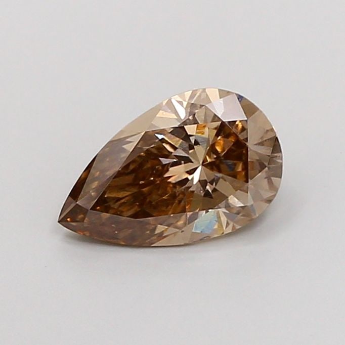 Loose Lab Diamond - IGI Pear 1.12ct Fancy Brown VVS2: Loose Lab Diamond - IGI Pear 1.12ct Fancy Brown VVS2 A truly unique and rare find, this 1.12ct Fancy Brown Lab Diamond boasts an exceptional VVS2 clarity and EX symmetry, making it a standout among it