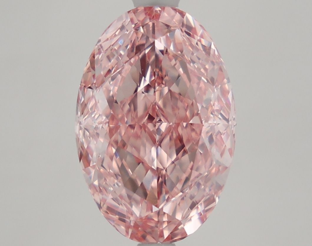 IGI Oval 4.06ct Fancy Vivid Pink VVS2 Loose Lab Diamond: IGI Oval 4.06ct Fancy Vivid Pink VVS2 Loose Lab Diamond Experience the rare beauty of a Fancy Vivid Pink diamond, one of the most coveted colors in the world of gemstones. This exceptional 4.06ct lab-