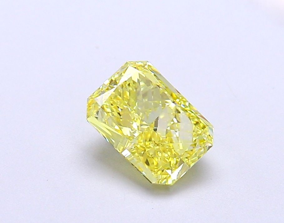 IGI Radiant 1.14ct Fancy Vivid Yellow IF Loose Lab Diamond: IGI Radiant 1.14ct Fancy Vivid Yellow IF Loose Lab Diamond Experience the brilliance of nature in a lab-grown wonder, the IGI Radiant 1.14ct Fancy Vivid Yellow IF Loose Lab Diamond. This exquisite