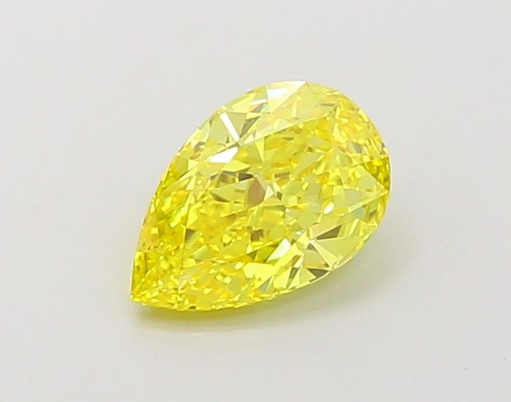 Loose Lab Diamond - IGI Pear 1.02ct Fancy Vivid Yellow VVS1: Loose Lab Diamond - IGI Pear 1.02ct Fancy Vivid Yellow VVS1 Experience the brilliance of nature, redefined - this exquisite 1.02ct Fancy Vivid Yellow Lab diamond boasts an exceptional VVS1 clarity and