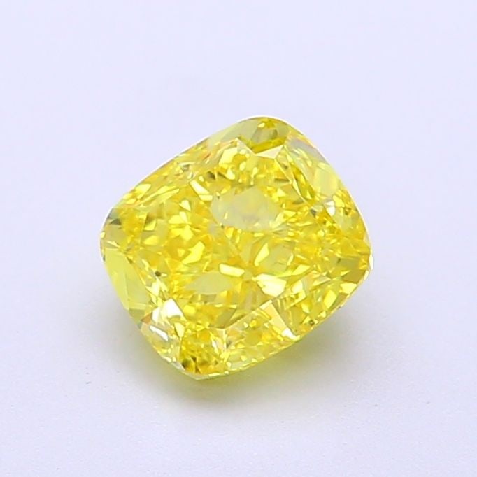 Loose Lab Diamond - IGI Cushion Modified 1.17ct Fancy Vivid Yellow VVS2: Loose Lab Diamond - IGI Cushion Modified 1.17ct Fancy Vivid Yellow VVS2 A true gem for the discerning collector, this 1.17ct Fancy Vivid Yellow Lab diamond boasts exceptional clarity and color, with a