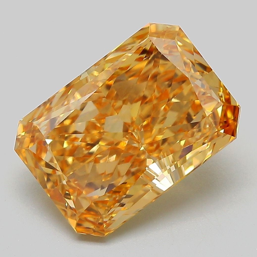 IGI Radiant 5.08ct Fancy Vivid Orangey Yellow VVS2 Loose Lab Diamond: IGI Radiant 5.08ct Fancy Vivid Orangey Yellow VVS2 Loose Lab Diamond Experience the vibrant beauty of nature with this stunning 5.08ct Fancy Vivid Orangey Yellow VVS2 lab-grown diamond, certified by I