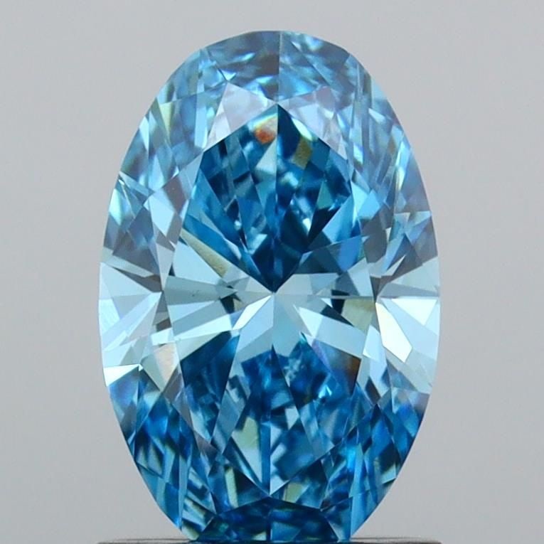 IGI Oval 1.2ct Fancy Vivid Blue VVS2 Loose Lab Diamond: IGI Oval 1.2ct Fancy Vivid Blue VVS2 Loose Lab Diamond Experience the breathtaking beauty of nature in a lab-grown Fancy Vivid Blue diamond, certified by the International Gemological Institute (IGI).