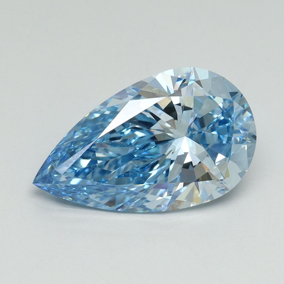 Loose Lab Diamond - IGI Pear 3.19ct Fancy Vivid Blue VVS2: Loose Lab Diamond - IGI Pear 3.19ct Fancy Vivid Blue VVS2 Experience the breathtaking beauty of a lab-grown diamond, certified by the International Gemological Institute (IGI) as Fancy Vivid Blue,