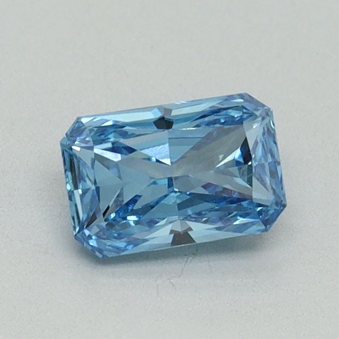 IGI Radiant 0.59ct Fancy Vivid Blue VVS2 Loose Lab Diamond: IGI Radiant 0.59ct Fancy Vivid Blue VVS2 Loose Lab Diamond Experience the breathtaking beauty of a lab-grown Fancy Vivid Blue diamond, certified by IGI and boasting exceptional clarity (VVS2) and cut