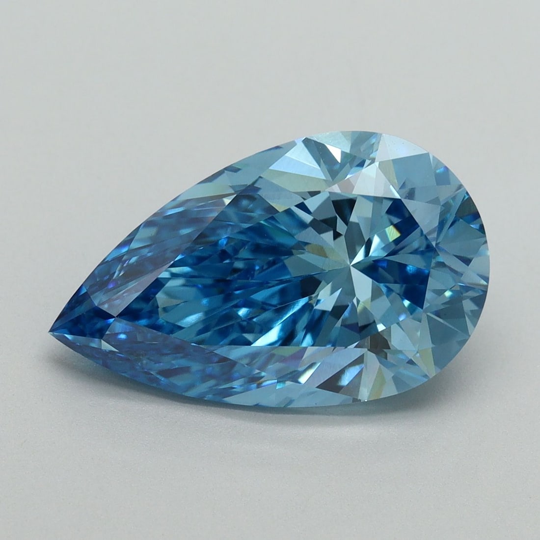 Loose Lab Diamond - IGI Pear 5.25ct Fancy Vivid Blue VVS2: Loose Lab Diamond - IGI Pear 5.25ct Fancy Vivid Blue VVS2 Experience the rare beauty of a lab-grown Fancy Vivid Blue diamond, certified by the International Gemological Institute (IGI) as VVS2