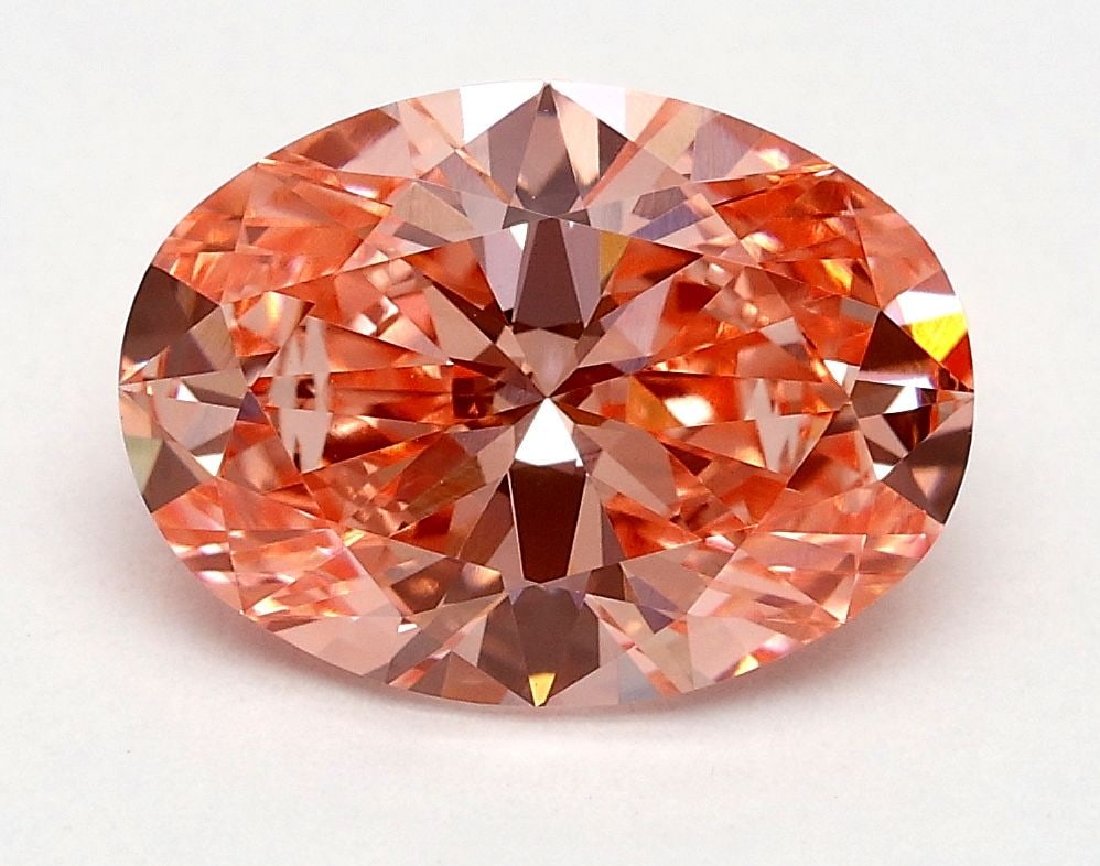 IGI Oval 1.72ct Fancy Vivid Pink VVS2 Loose Lab Diamond: IGI Oval 1.72ct Fancy Vivid Pink VVS2 Loose Lab Diamond Experience the rare beauty of a Fancy Vivid Pink diamond, one of the most coveted colors in diamonds. This stunning 1.72ct lab-grown gem boasts