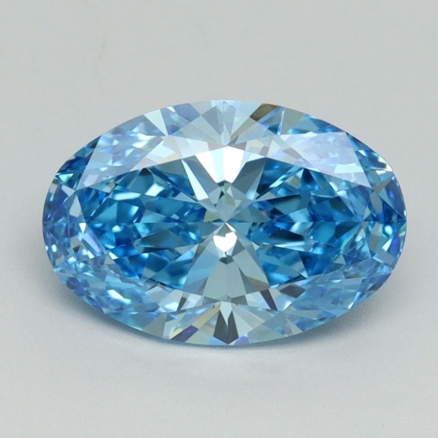 IGI Oval 1.69ct Fancy Vivid Blue VVS2 Loose Lab Diamond: IGI Oval 1.69ct Fancy Vivid Blue VVS2 Loose Lab Diamond Experience the breathtaking beauty of a Fancy Vivid Blue diamond, one of the rarest and most coveted colors in nature. This 1.69ct IGI-certified