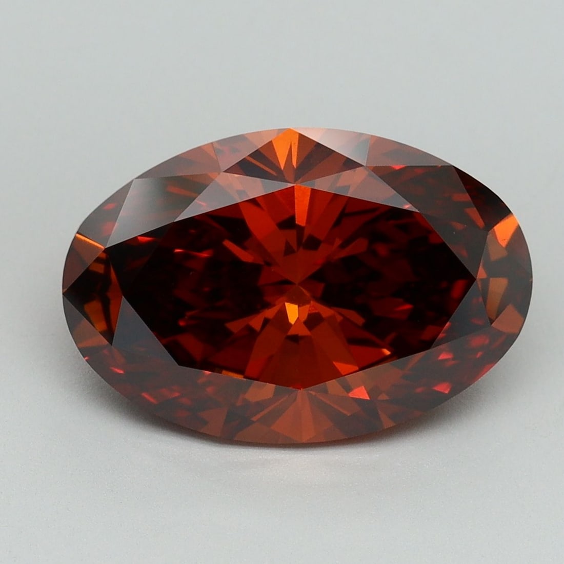 IGI Oval 5.01ct Fancy Deep Orange VVS2 Loose Lab Diamond: IGI Oval 5.01ct Fancy Deep Orange VVS2 Loose Lab Diamond Experience the vibrant beauty of nature with this stunning 5.01ct Fancy Deep Orange VVS2 loose lab diamond, boasting exceptional clarity and po