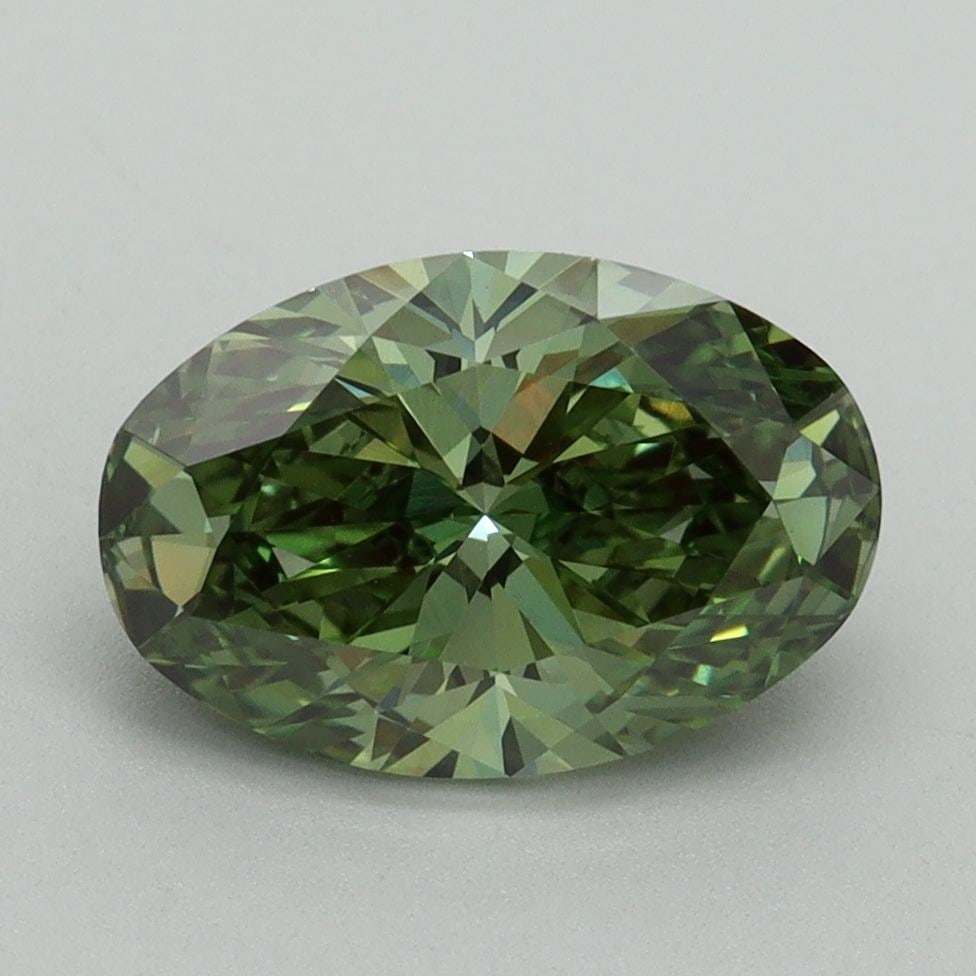 IGI Oval 2.11ct Fancy Vivid Green VVS2 Loose Lab Diamond: IGI Oval 2.11ct Fancy Vivid Green VVS2 Loose Lab Diamond Experience the unparalleled beauty of nature in this stunning 2.11ct Fancy Vivid Green VVS2 loose lab diamond, certified by IGI and boasting ex