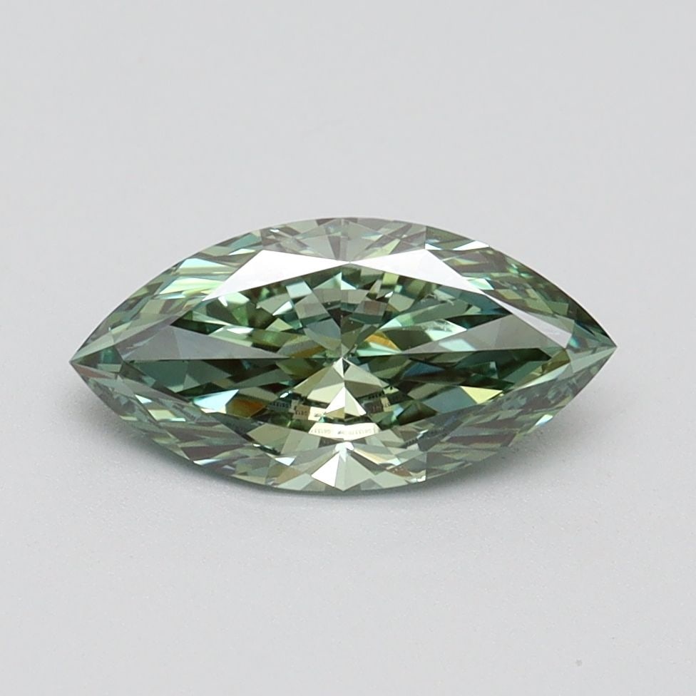 IGI Marquise 1.0ct Fancy Vivid Green VVS2 Loose Lab Diamond: IGI Marquise 1.0ct Fancy Vivid Green VVS2 Loose Lab Diamond Experience the rare beauty of a Fancy Vivid Green lab-grown diamond, certified by IGI and boasting exceptional clarity, cut, and polish. Thi