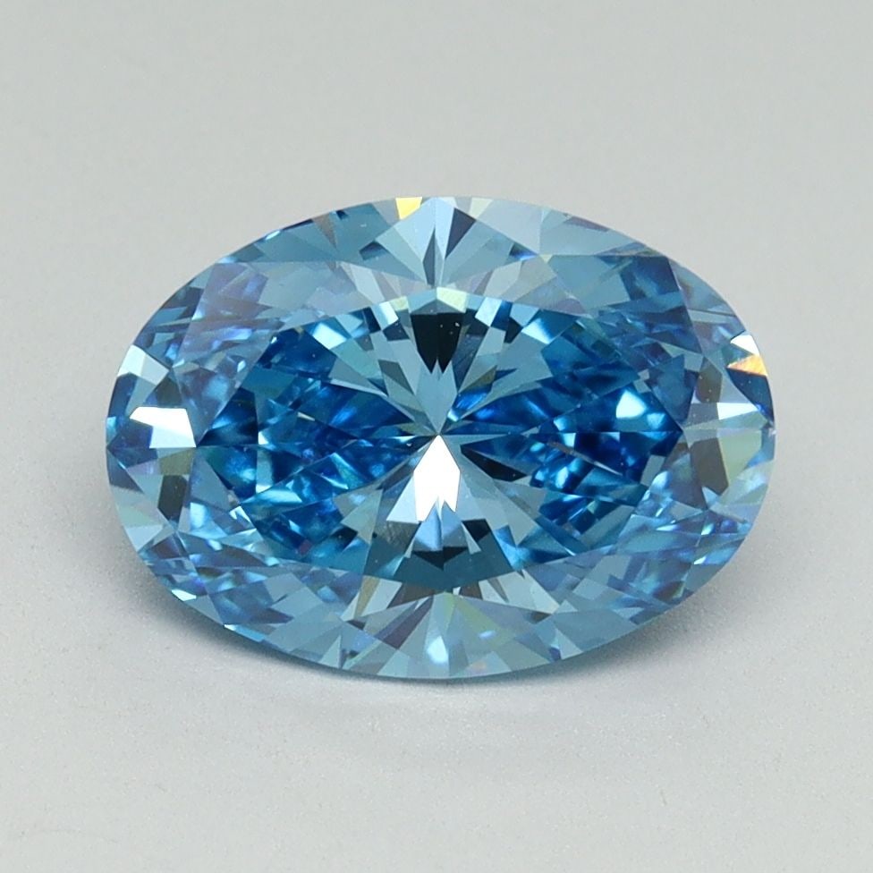 IGI Oval 2.11ct Fancy Vivid Blue VVS2 Loose Lab Diamond: IGI Oval 2.11ct Fancy Vivid Blue VVS2 Loose Lab Diamond Experience the breathtaking beauty of a Fancy Vivid Blue diamond, one of the rarest and most coveted colors in nature. This stunning 2.11ct lab-
