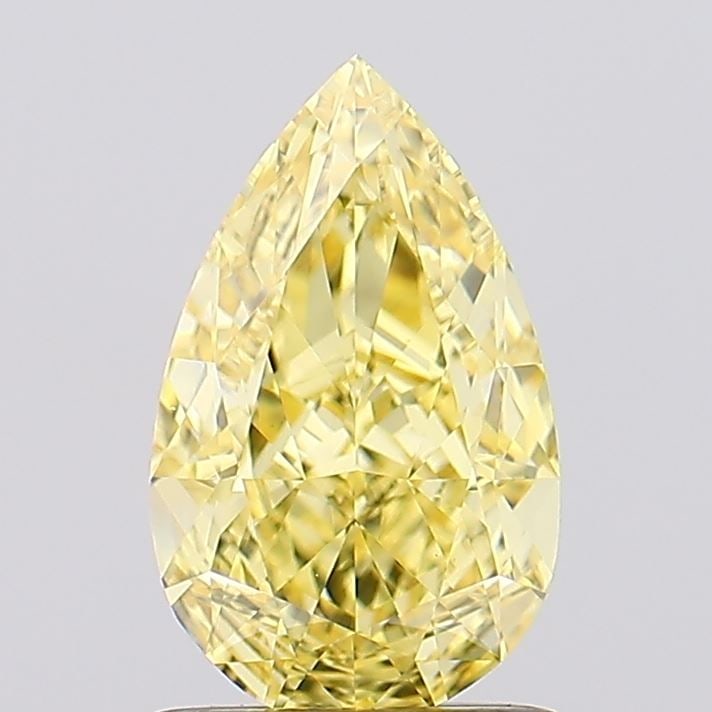 Loose Lab Diamond - IGI Pear 1.32ct Fancy Vivid Yellow VVS2: Loose Lab Diamond - IGI Pear 1.32ct Fancy Vivid Yellow VVS2 A rare and radiant gem, this 1.32ct IGI-certified lab diamond boasts an exceptional Fancy Vivid Yellow color, rivaling the brightest sunshin