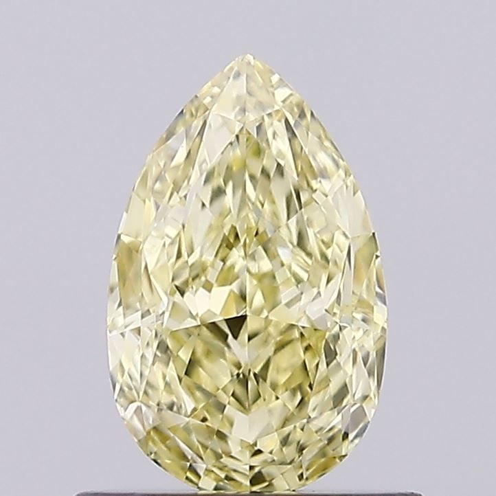 Loose Lab Diamond - IGI Pear 0.77ct Fancy Intense Yellow VVS2: Loose Lab Diamond - IGI Pear 0.77ct Fancy Intense Yellow VVS2 Experience the vibrant beauty of a lab-grown diamond, expertly certified by the International Gemological Institute (IGI) as a Fancy Inten