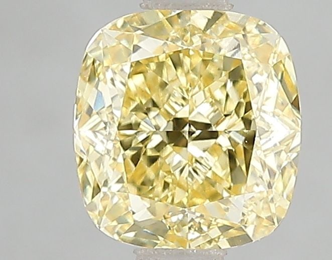 Loose Lab Diamond - IGI Cushion Modified 1.57ct Fancy Vivid Yellow VVS2: Loose Lab Diamond - IGI Cushion Modified 1.57ct Fancy Vivid Yellow VVS2 Experience the brilliance of nature's own sunshine with this stunning 1.57ct Fancy Vivid Yellow lab diamond, certified by IGI an