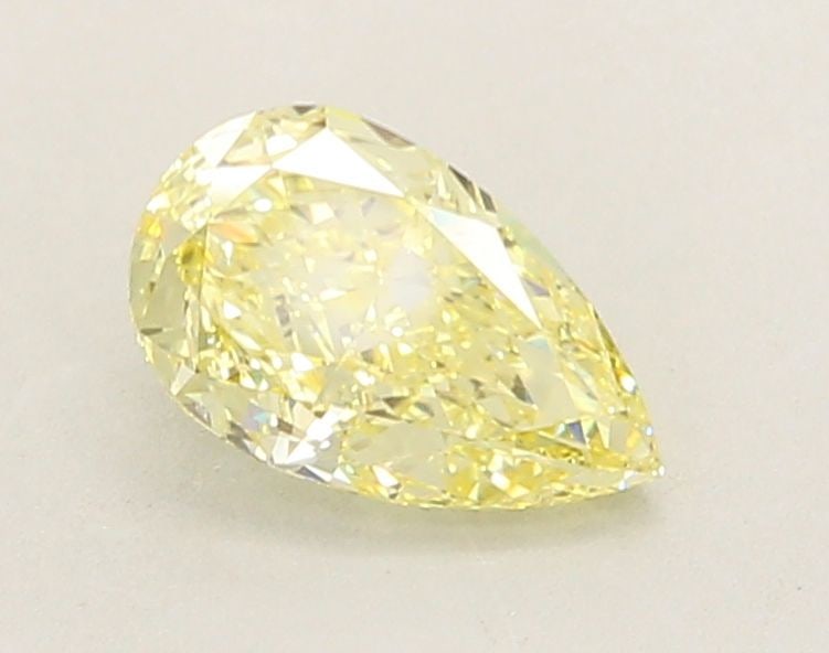Loose Lab Diamond - IGI Pear 1.19ct Fancy Yellow VVS2: Loose Lab Diamond - IGI Pear 1.19ct Fancy Yellow VVS2 Experience the beauty of a lab-grown diamond, certified by IGI as Fancy Yellow in color and VVS2 clarity, with exceptional polish and symmetry.