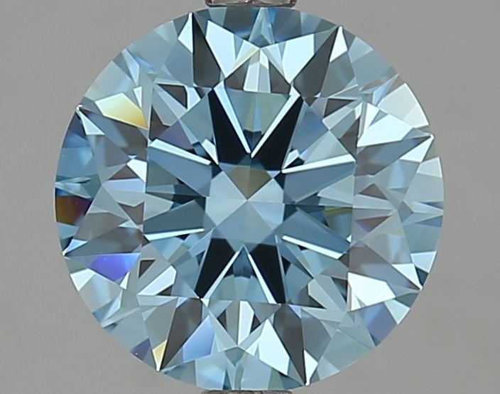 IGI Round 2.7ct Fancy Vivid Blue VVS2 Ideal Loose Lab Diamond: IGI Round 2.7ct Fancy Vivid Blue VVS2 Ideal Loose Lab Diamond Experience the breathtaking beauty of a Fancy Vivid Blue diamond, one of the rarest and most stunning colors in nature. This 2.7ct IGI-cer