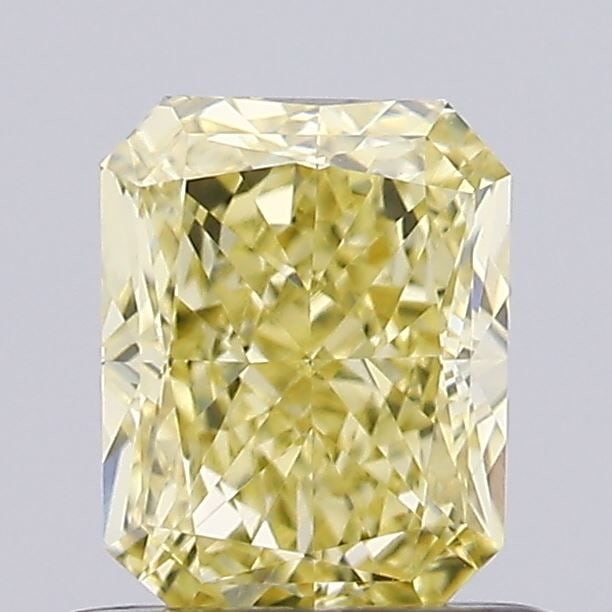IGI Radiant 0.74ct Fancy Vivid Yellow VVS1 Loose Lab Diamond: IGI Radiant 0.74ct Fancy Vivid Yellow VVS1 Loose Lab Diamond Experience the vibrant beauty of a lab-grown diamond, certified by IGI as Fancy Vivid Yellow with exceptional clarity and cut. This