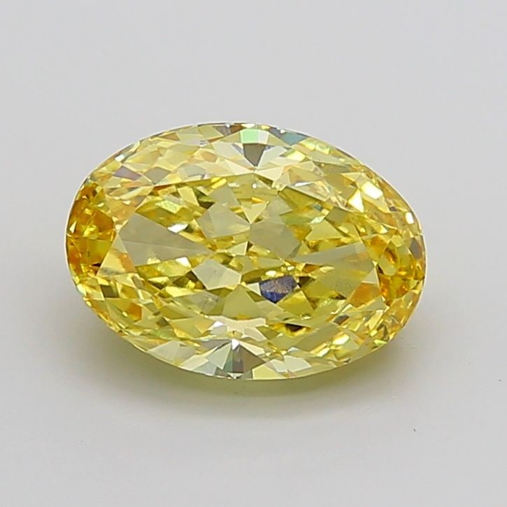 IGI Oval 7.08ct Fancy Intense Yellow VVS2 Loose Lab Diamond: IGI Oval 7.08ct Fancy Intense Yellow VVS2 Loose Lab Diamond Experience the vibrant beauty of nature in this stunning 7.08ct Fancy Intense Yellow VVS2 loose lab diamond, certified by the International